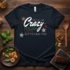 Black t-shirt with white and green text that reads "THEY CALL ME Crazy ITALIAN LADY AS IF IT'S A BAD