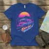 Retro RV camper van design with the text "They See me Rollin'" on a blue t-shirt, featuring a vibrant sunset
