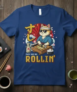 They See Me Rollin' t-shirt design with a kawaii cat chef making sushi, featuring Japanese wave and cherry blossom elements
