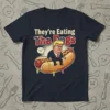 They're Eating The Dogs political humor t-shirt with Donald Trump sitting on a hot dog