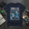 Navy t-shirt with "Things I Do While Ghost Hunting" and six comic panels detailing humorous ghost hunting scenarios