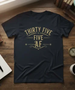 Navy t-shirt with gold distressed text "THIRTY FIVE FIVE AF" in vintage typography, celebrating a 35th birthday