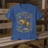 This Ain't My First Rodeo text with a cowboy riding a bucking horse graphic on a blue t-shirt