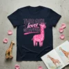 This Girl Loves Giraffes text with a pink cartoon giraffe graphic on a navy blue t-shirt