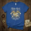 This Guy Loves His Valerie text design with a golden heart and strong arms, printed on a blue t-shirt