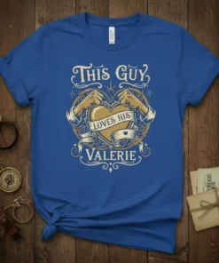 This Guy Loves His Valerie text design with a golden heart and strong arms, printed on a blue t-shirt