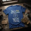 This is Bob. Bob has no arms. Knock, nock. Who Is It? It isn't Bob. funny joke t-shirt with stick