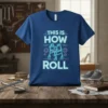 This Is How I Roll text with a graphic of a walker and gears on a blue t-shirt