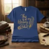 This is is my Writing Shirt design with golden inkwell, quill, and feather graphic on a blue t-shirt