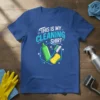 This is my CLEANING SHIRT graphic tee with cleaning supplies: green spray bottle, yellow sponge, and blue scrub brush