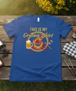 Royal blue t-shirt with "THIS IS MY Grilling Shirt" text, featuring a grill, beer, and utensils graphic