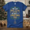 Blue t-shirt with "This Is My Human Costume I'm Really A Christmas Tree" text and festive holiday graphics