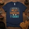 This Is My Meat Smoking T-Shirt design with vintage typography and crossed cleavers, perfect for BBQ grill masters