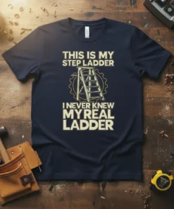 Navy t-shirt with bold yellow text "THIS IS MY STEP LADDER I NEVER KNEW MY REAL LADDER" and a graphic
