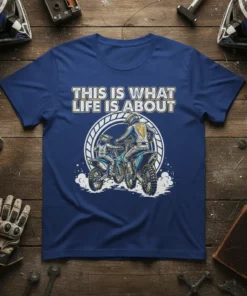 This Is What Life Is About text with two motocross riders on bikes, graphic design on a blue t-shirt