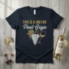 Dark t-shirt with "THIS IS A JOB FOR Pinot Grigio" text, grapes, and wine glass graphic