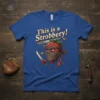 This is a Strobbery! text with a ninja strawberry holding knives and coins, blue t-shirt design