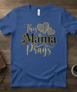 Blue t-shirt with "This Mama Prays" text in gold and black glitter, featuring ornate heart graphics