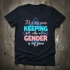 TIA is my name KEEPING the GENDER is my game text on a black t-shirt, gender reveal design with baby