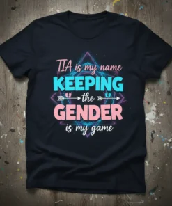 TIA is my name KEEPING the GENDER is my game text on a black t-shirt, gender reveal design with baby