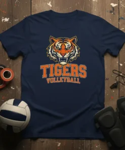 Navy blue t-shirt featuring a fierce tiger mascot head and the text "TIGERS VOLLEYBALL" in orange and white lettering