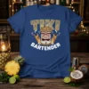 Tiki Bartender graphic t-shirt design featuring a fierce tiki mask holding cocktail shakers, with "Tiki Bartender" text