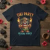 Tiki Party Island Vibes t-shirt featuring a cartoon tiki character holding torches, with tropical text and flames