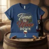 Blue t-shirt with "Time to Wine DOWN" text, grapes, and wine glass graphic