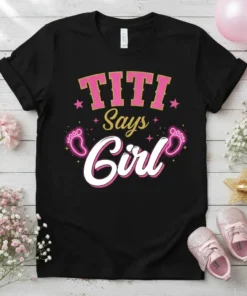 Black t-shirt with "TITI Says Girl" text, pink glitter accents, and baby footprints graphic