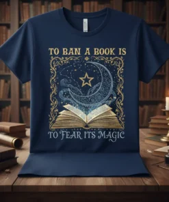 Navy t-shirt with "To Ban A Book Is To Fear Its Magic" quote and a celestial moon and star graphic