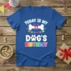 Blue t-shirt with "TODAY IS MY DOG'S BIRTHDAY" text, a bone graphic, and paw print, celebrating a dog's special day