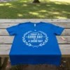 Blue t-shirt with white text "TODAY IS A GOOD DAY for A GOOD DAY" in a laurel wreath design