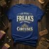 Too Many Freaks Not Enough Circuses quote with vintage circus tent graphic on a blue t-shirt