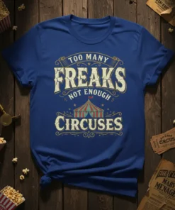 Too Many Freaks Not Enough Circuses quote with vintage circus tent graphic on a blue t-shirt