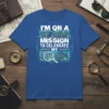 T-shirt featuring the text "I'M ON A TOP SECRET MISSION TO CELEBRATE MY BIRTHDAY" in blue and white with digital