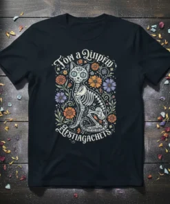 Tow a Quiprem Aestiagachets skeleton cat design with Day of the Dead flowers on a black t-shirt