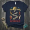 Navy t-shirt featuring a graphic of a stone path with blood splatters, representing the TRAIL OF TEARS WHERE THOUSANDS OF