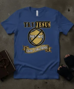 Blue t-shirt with the text "Try Jesus Not Me Cause I Lay Hands" in bold yellow and black font, featuring