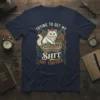 Trying to Get My Shit Shit Together text on a navy t-shirt with a fluffy white cat sitting in a