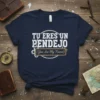 Navy t-shirt with white text "TU ERES UN PENDEJO" and smaller text "(You Are My Friend)" below, featuring vintage distressed
