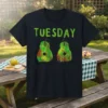 Black t-shirt with green distressed text "TUESDAY" above two green and red painted pears