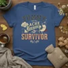 Tummy Ache Survivor t-shirt with a cartoon stomach character and distressed text