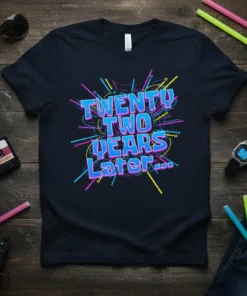 Retro graphic t-shirt with "TWENTY TWO YEARS Later..." text in vibrant neon colors, surrounded by abstract lines