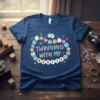 Twinning With My Bestie text design with colorful stars, dice, and flowers on a navy blue t-shirt