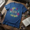 Blue t-shirt with the word "two" in gold script surrounded by colorful watercolor splashes and golden wings graphic