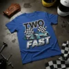 Two Fast race car birthday t-shirt design with bold text and a blue race car with checkered flags
