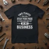 Black t-shirt with white text reading "TWO PLACES YOU CAN STAY FOR FREE IN YOUR LANE AND OUT OF MY