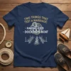 Navy t-shirt with "TWO THINGS THAT TEST A MARRIAGE: - HAVING KIDS - DOCKING A BOAT" text and a nautical