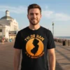 Tylor Ham It's A Jersey Thing T-Shirt featuring a black silhouette of New Jersey within an orange circle, with text