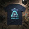UFO Cat Selfie t-shirt design showing a cat in a spacesuit taking a selfie with a UFO overhead